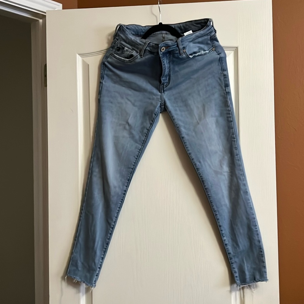 Light washed, distressed in all the right areas fitted jeans